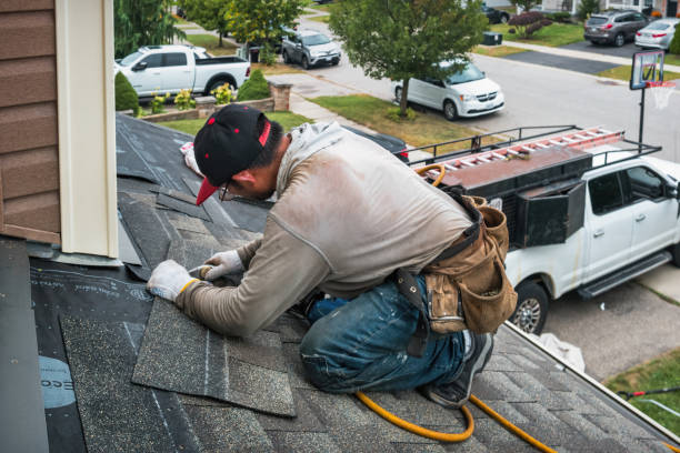 Professional Gutter Repair And Installation technician working in Reno, OH